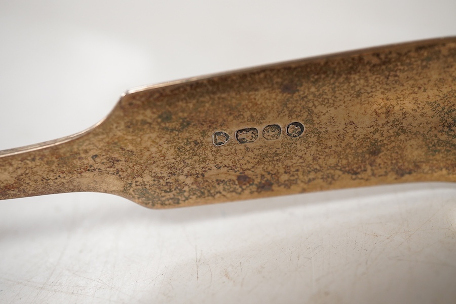 A pair of Victorian silver fiddle pattern asparagus servers, Francis Higgins, London, 1861, 24.5cm.